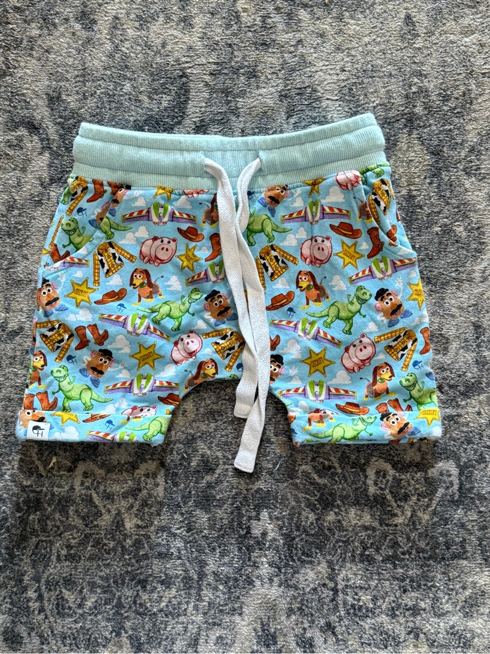Light Blue Kids' Drawstring Shorts with Playful Toy Print